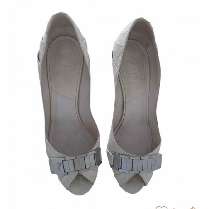 Dior white leather peep toes with logo engraved hardware 