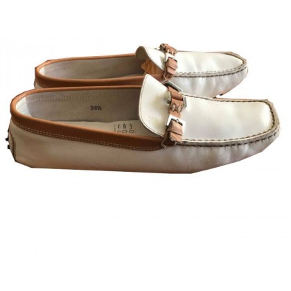 Tod’s flat moccasins in white leather with brown details 